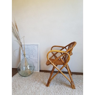 Fauteuil en rotin vintage pieds compas